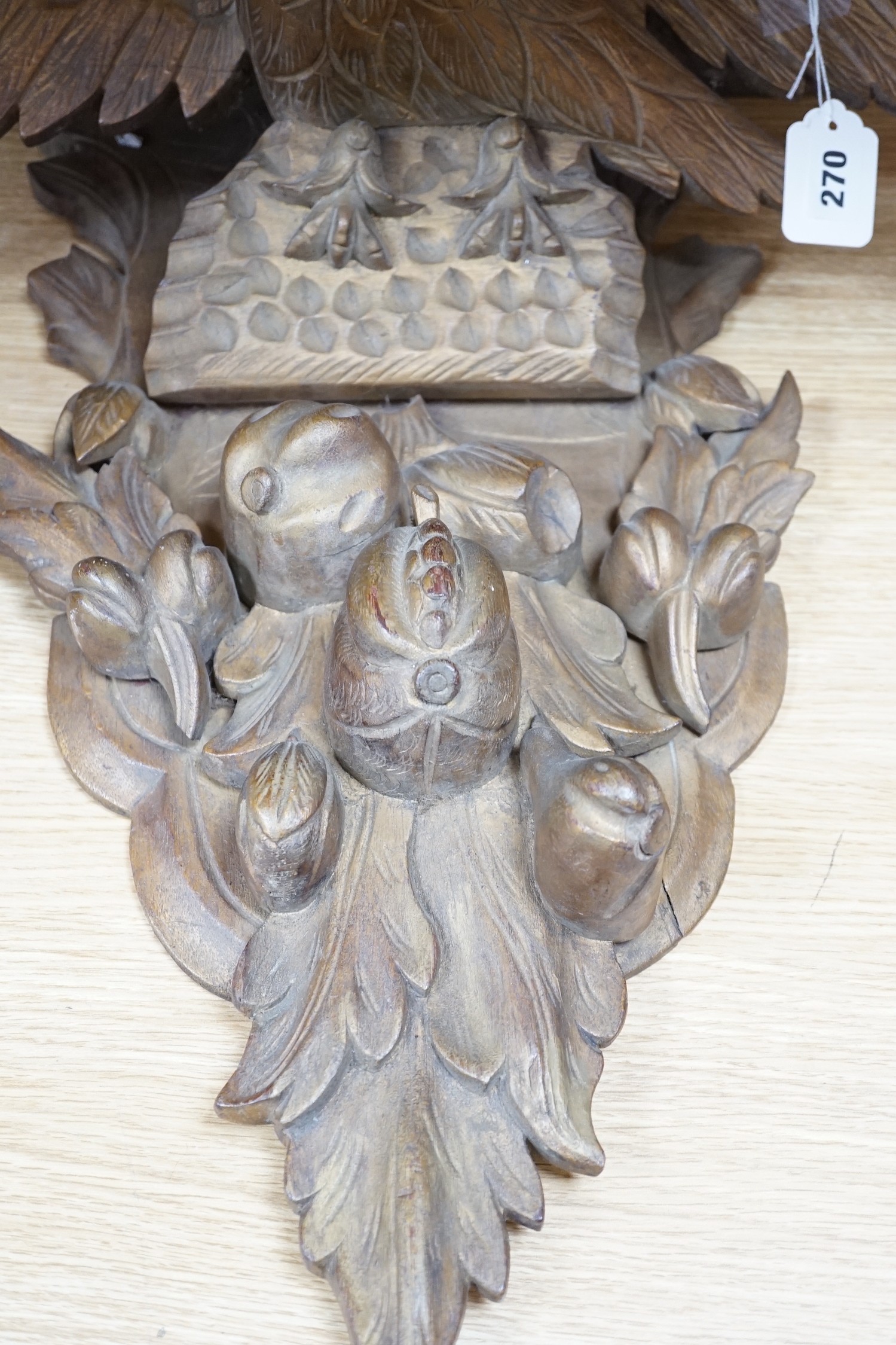 A carved gilt wood ‘eagle’ wall bracket, 62cm long